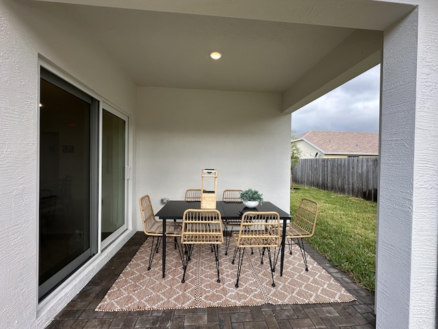 306 Silver Sands Ln Unit 17, Fort Pierce, FL 34945 - view of patio with outdoor dining space