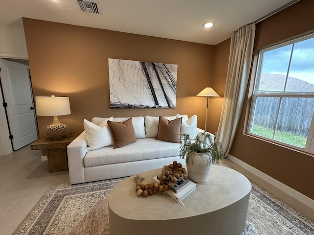 306 Silver Sands Ln Unit 17, Fort Pierce, FL 34945 - living room featuring baseboards and recessed lighting