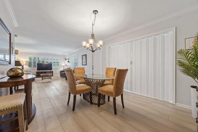 10116 46th Ave S Unit 488, Boynton Beach, FL 33436 - dining room featuring a chandelier, light wood-type flooring, ornamental molding, and baseboards