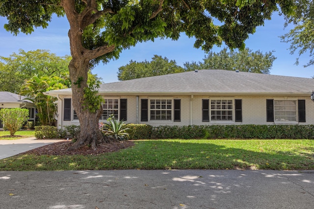 10116 46th Ave S Unit 488, Boynton Beach, FL 33436 - single story home with brick siding, a front lawn, and a shingled roof