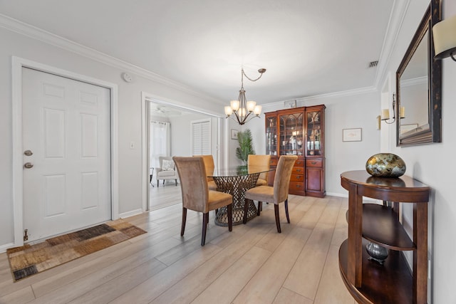 10116 46th Ave S Unit 488, Boynton Beach, FL 33436 - dining room with a chandelier, light wood-type flooring, ornamental molding, and baseboards