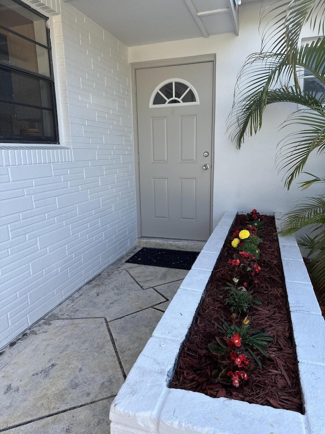 659 Snead Cir, West Palm Beach, FL 33413 - property entrance with brick siding