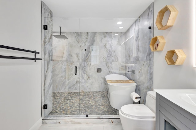 17495 40th Run N, Loxahatchee, FL 33470 - bathroom with a marble finish shower, vanity, marble finish flooring, recessed lighting, and toilet