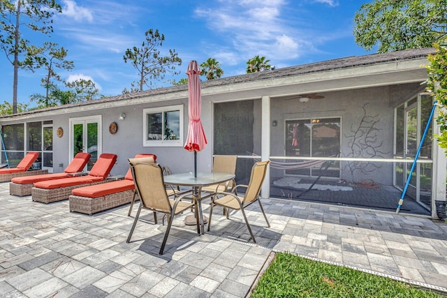 17495 40th Run N, Loxahatchee, FL 33470 - view of patio with outdoor dining area and a ceiling fan