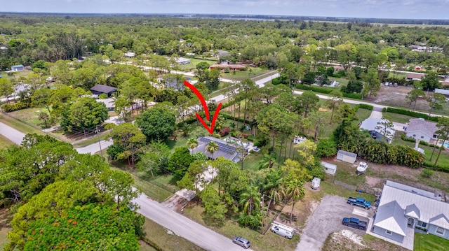 17495 40th Run N, Loxahatchee, FL 33470 - aerial view of property and surrounding area with a forest