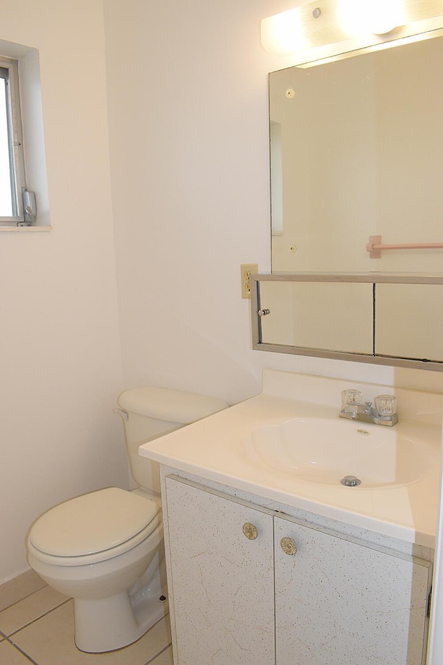 2930 Crosley Dr E Unit G, West Palm Beach, FL 33415 - bathroom with vanity, toilet, and tile patterned floors