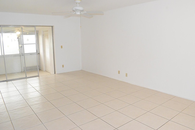 2930 Crosley Dr E Unit G, West Palm Beach, FL 33415 - spare room featuring ceiling fan and light tile patterned flooring