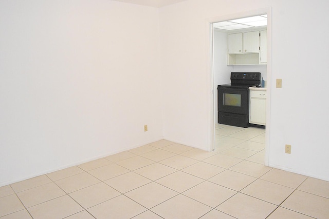 2930 Crosley Dr E Unit G, West Palm Beach, FL 33415 - spare room with light tile patterned floors
