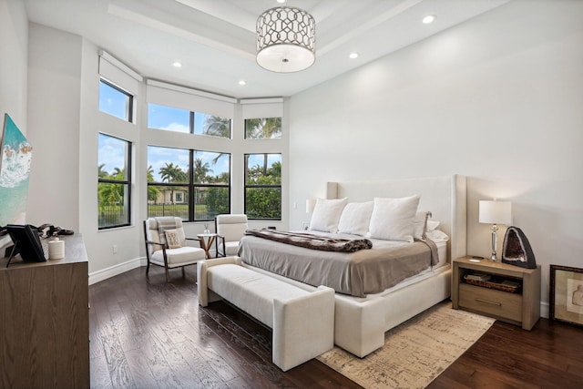 16770 Burlington Bristol Ln, Delray Beach, FL 33446 - bedroom with multiple windows, dark wood finished floors, recessed lighting, a towering ceiling, and a raised ceiling