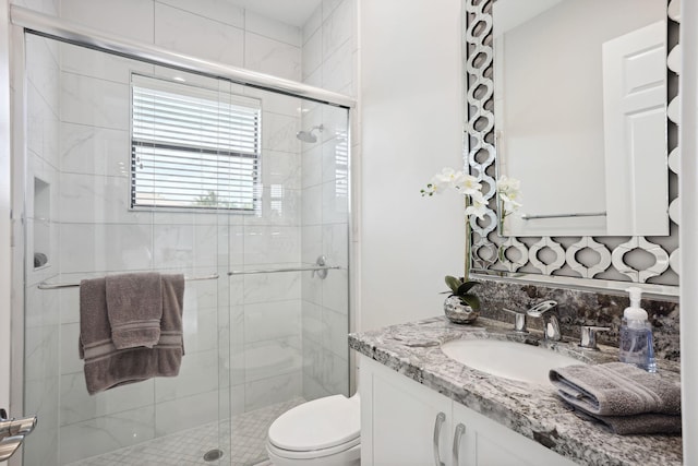 16770 Burlington Bristol Ln, Delray Beach, FL 33446 - bathroom with toilet, vanity, and a shower stall