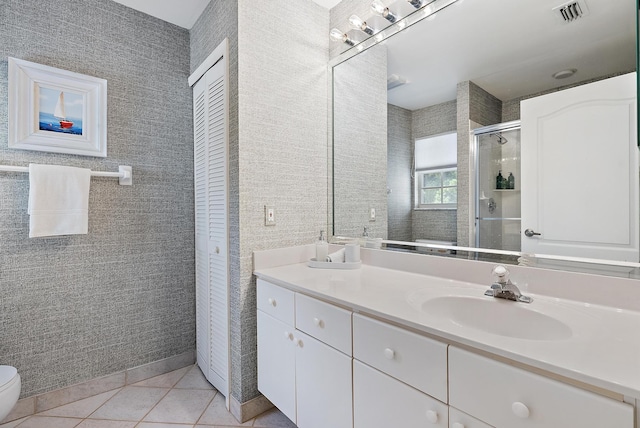 8208 Heritage Club Dr, West Palm Beach, FL 33412 - bathroom with vanity, a closet, tile patterned flooring, toilet, and a stall shower