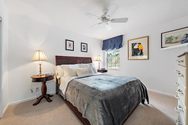 8208 Heritage Club Dr, West Palm Beach, FL 33412 - carpeted bedroom with baseboards, a textured ceiling, and ceiling fan
