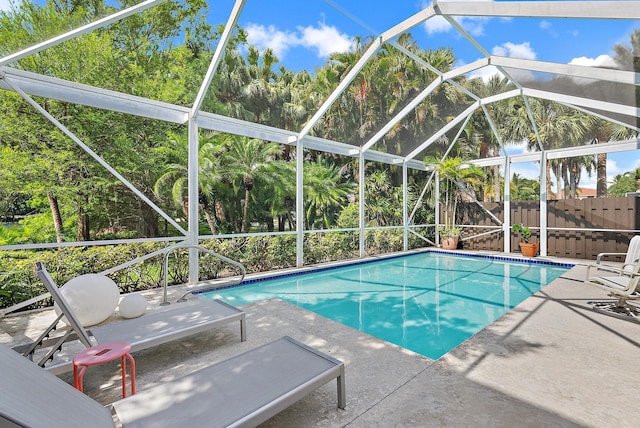8208 Heritage Club Dr, West Palm Beach, FL 33412 - view of swimming pool featuring a patio area and a lanai