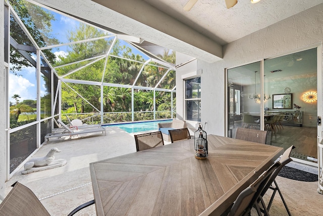 8208 Heritage Club Dr, West Palm Beach, FL 33412 - view of patio / terrace featuring an outdoor pool, outdoor dining area, a ceiling fan, and glass enclosure