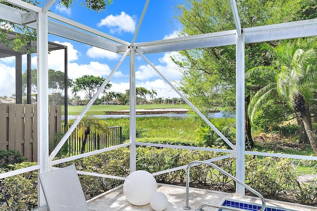 8208 Heritage Club Dr, West Palm Beach, FL 33412 - unfurnished sunroom with a water view