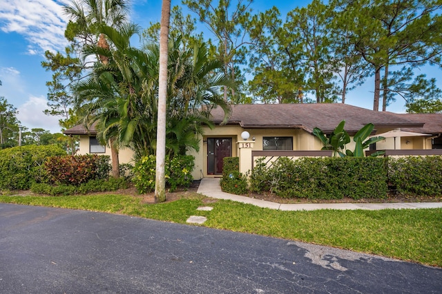 151 Pinto Palm Ct, Royal Palm Beach, FL 33411 - view of front of home with stucco siding