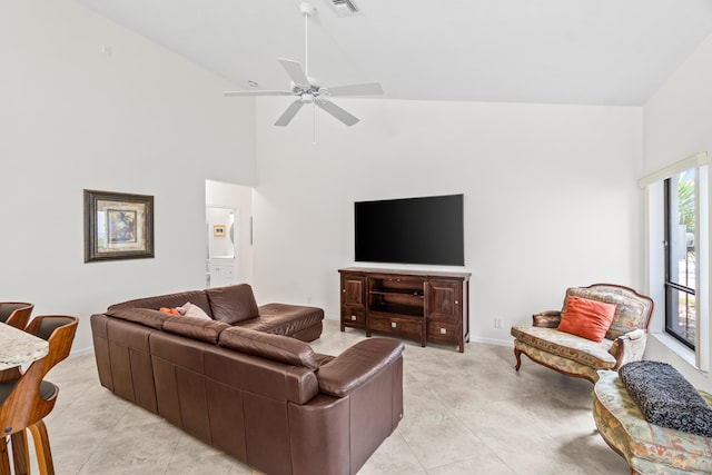 10194 N Lexington Cir, Boynton Beach, FL 33436 - living area with high vaulted ceiling, ceiling fan, light tile patterned floors, and baseboards