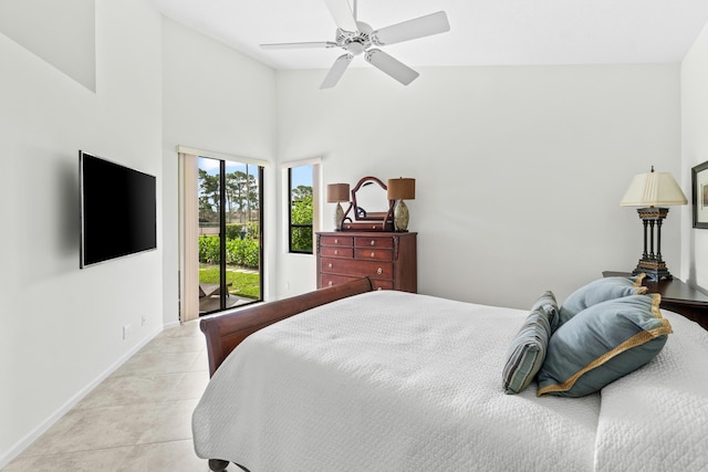 10194 N Lexington Cir, Boynton Beach, FL 33436 - bedroom with baseboards, access to exterior, light tile patterned floors, ceiling fan, and a high ceiling