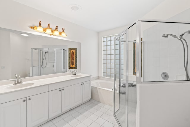 10194 N Lexington Cir, Boynton Beach, FL 33436 - full bath featuring a shower stall, a garden tub, double vanity, and tile patterned floors