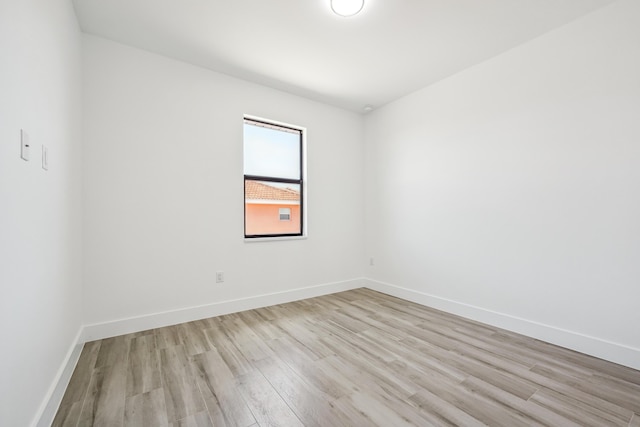 2458 NW 9th Ter, Cape Coral, FL 33993 - empty room with light wood-style flooring and baseboards