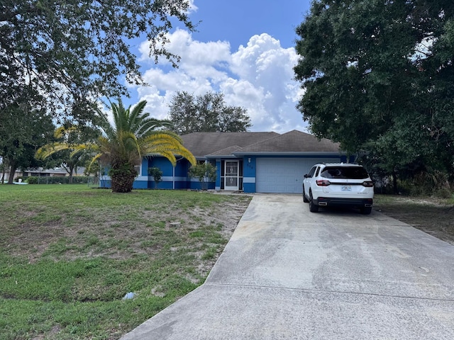 908 SW Connecticut Ter, Port Saint Lucie, FL 34953 - single story home featuring an attached garage, concrete driveway, stucco siding, and a front lawn