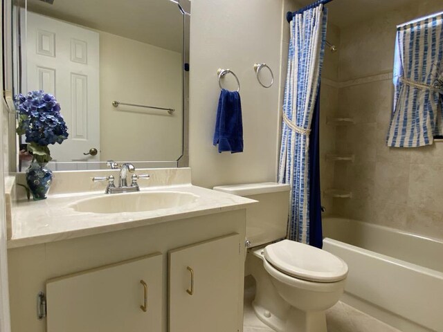 4273 Oak Terrace Dr, Greenacres, FL 33463 - full bathroom featuring toilet, vanity, shower / tub combo with curtain, and tile patterned flooring