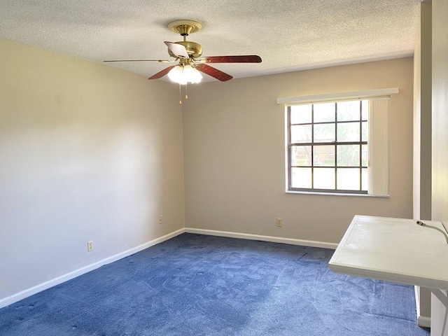 4273 Oak Terrace Dr, Greenacres, FL 33463 - empty room featuring carpet floors, a ceiling fan, baseboards, and a textured ceiling