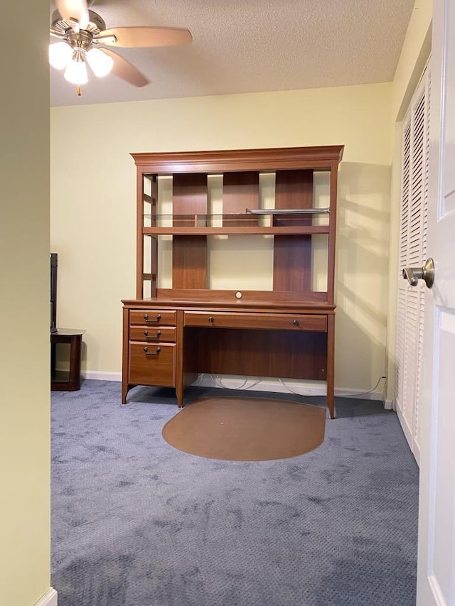 4273 Oak Terrace Dr, Greenacres, FL 33463 - unfurnished office with carpet, a ceiling fan, baseboards, and a textured ceiling