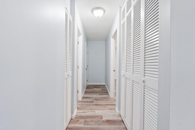903 S 27th St, Fort Pierce, FL 34947 - corridor with light wood-style floors and baseboards