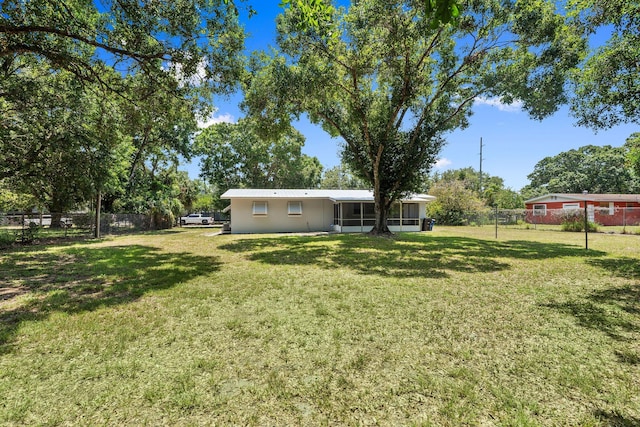 903 S 27th St, Fort Pierce, FL 34947 - view of yard featuring a sunroom