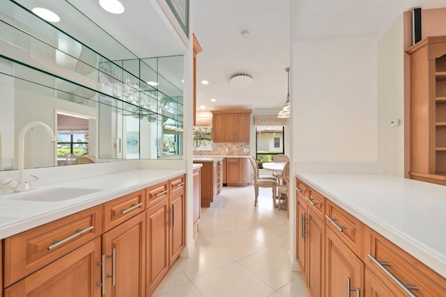 4402 SW Dundee Ct, Palm City, FL 34990 - bar with a sink, tasteful backsplash, light tile patterned floors, and pendant lighting
