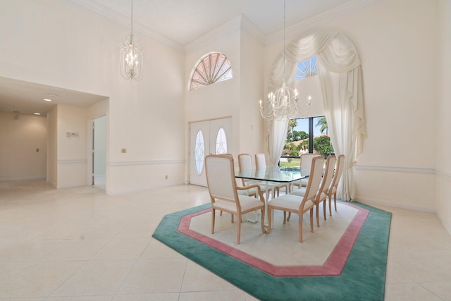 4402 SW Dundee Ct, Palm City, FL 34990 - dining space featuring a chandelier, tile patterned flooring, baseboards, ornamental molding, and a high ceiling