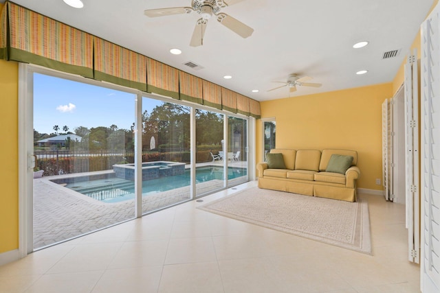 4402 SW Dundee Ct, Palm City, FL 34990 - sunroom / solarium featuring a jacuzzi