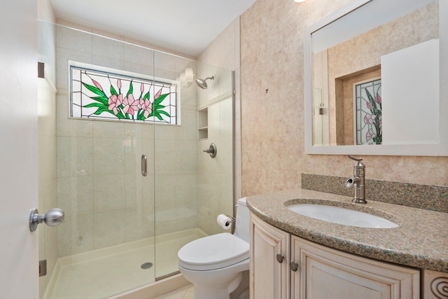 4402 SW Dundee Ct, Palm City, FL 34990 - bathroom with vanity, a shower stall, and toilet