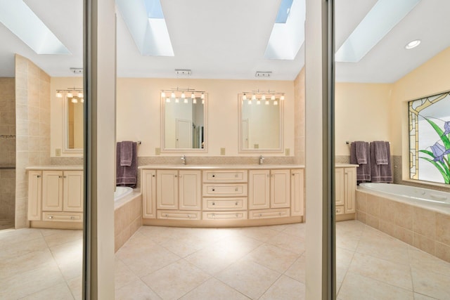 4402 SW Dundee Ct, Palm City, FL 34990 - full bathroom with a skylight, double vanity, a bath, and tile patterned floors