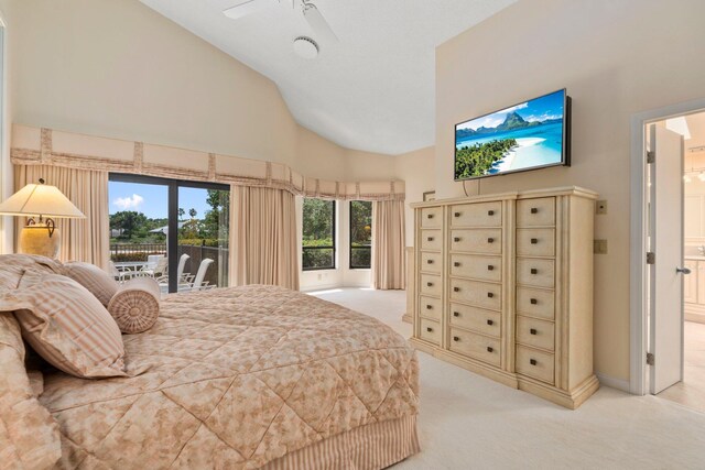 4402 SW Dundee Ct, Palm City, FL 34990 - bedroom featuring light carpet, high vaulted ceiling, access to outside, and a ceiling fan