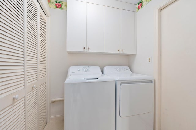 4402 SW Dundee Ct, Palm City, FL 34990 - laundry room with independent washer and dryer and cabinet space