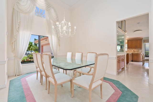 4402 SW Dundee Ct, Palm City, FL 34990 - dining room with a chandelier, light tile patterned floors, and crown molding
