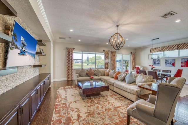 4858 Marginada Way, Lake Worth, FL 33467 - living area with a textured ceiling, a chandelier, ornamental molding, dark wood finished floors, and recessed lighting