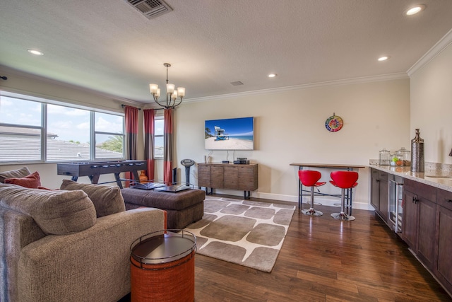 4858 Marginada Way, Lake Worth, FL 33467 - living room with crown molding, a chandelier, dark wood-type flooring, baseboards, and recessed lighting