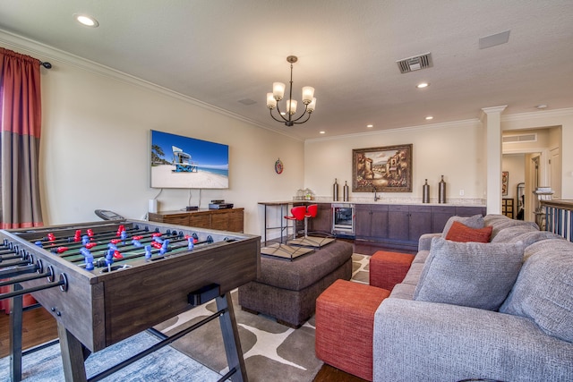 4858 Marginada Way, Lake Worth, FL 33467 - recreation room featuring beverage cooler, a chandelier, crown molding, and recessed lighting