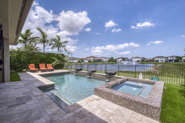 4858 Marginada Way, Lake Worth, FL 33467 - view of swimming pool featuring an in-ground hot tub, a patio area, a residential view, and a water view