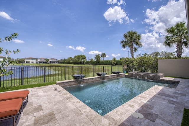 4858 Marginada Way, Lake Worth, FL 33467 - view of pool with an in-ground hot tub, a patio area, a fenced backyard, and a water view