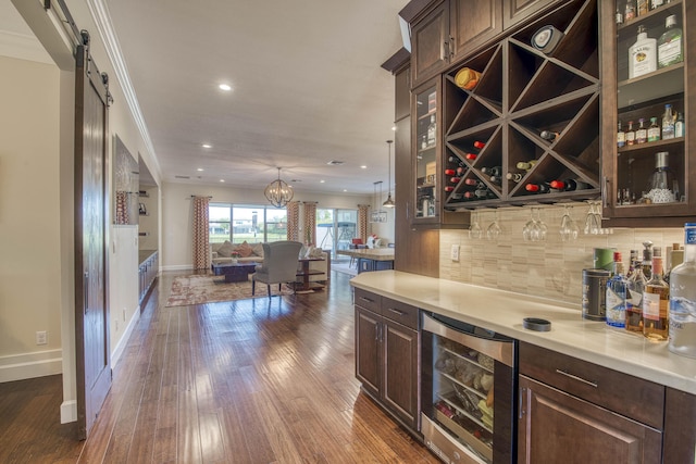 4858 Marginada Way, Lake Worth, FL 33467 - indoor dry bar featuring beverage cooler, baseboards, tasteful backsplash, dark wood-style flooring, and ornamental molding
