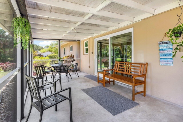 4971 N Kay St, Palm Beach Gardens, FL 33418 - sunroom / solarium with beam ceiling and outdoor dining area