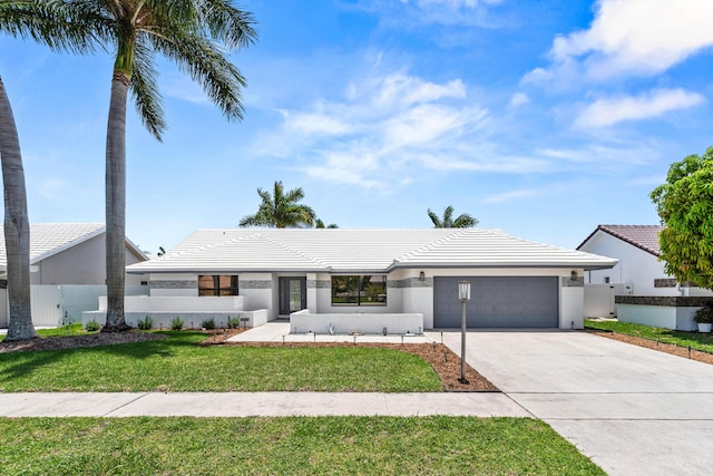9496 Majestic Way, Boynton Beach, FL 33437 - single story home with concrete driveway, an attached garage, a tile roof, and stucco siding