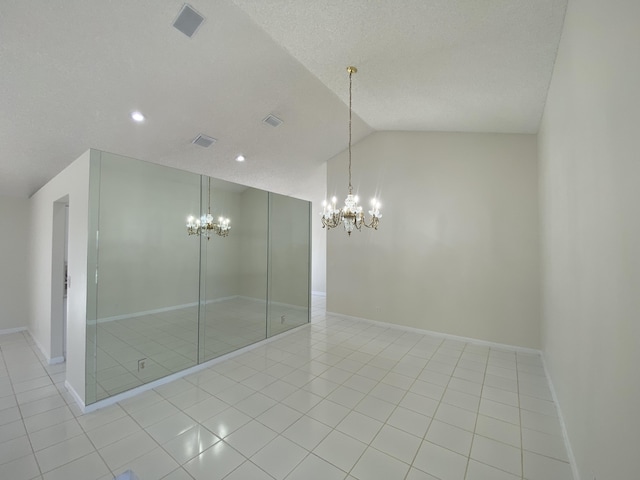 9496 Majestic Way, Boynton Beach, FL 33437 - spare room featuring a chandelier, tile patterned flooring, baseboards, vaulted ceiling, and recessed lighting
