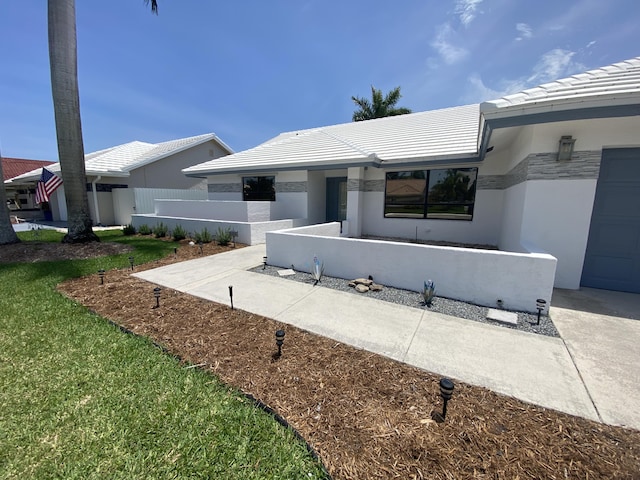 9496 Majestic Way, Boynton Beach, FL 33437 - view of front of house featuring a tiled roof and stucco siding