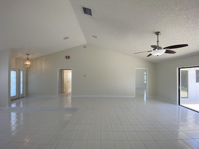 9496 Majestic Way, Boynton Beach, FL 33437 - spare room featuring vaulted ceiling, ceiling fan, a chandelier, light tile patterned floors, and baseboards