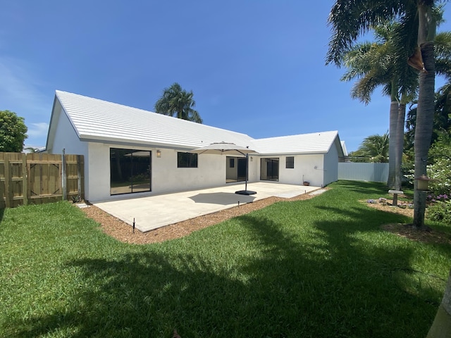 9496 Majestic Way, Boynton Beach, FL 33437 - rear view of property featuring a patio and stucco siding